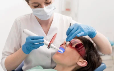 female-patient-having-procedure-done-dentist-scaled-1-400x250